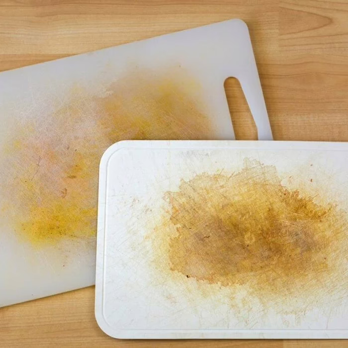 Scarred plastic cutting board that sheds microplastics